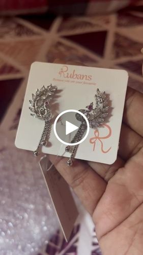 Customer video review of Rubans Silver-Toned Peacock Shaped Drop Earrings