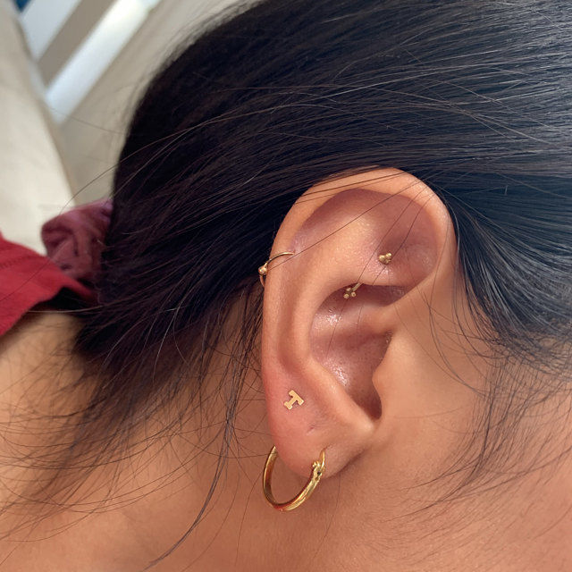 Customer photo review of 14k Solid Gold Initial Earrings