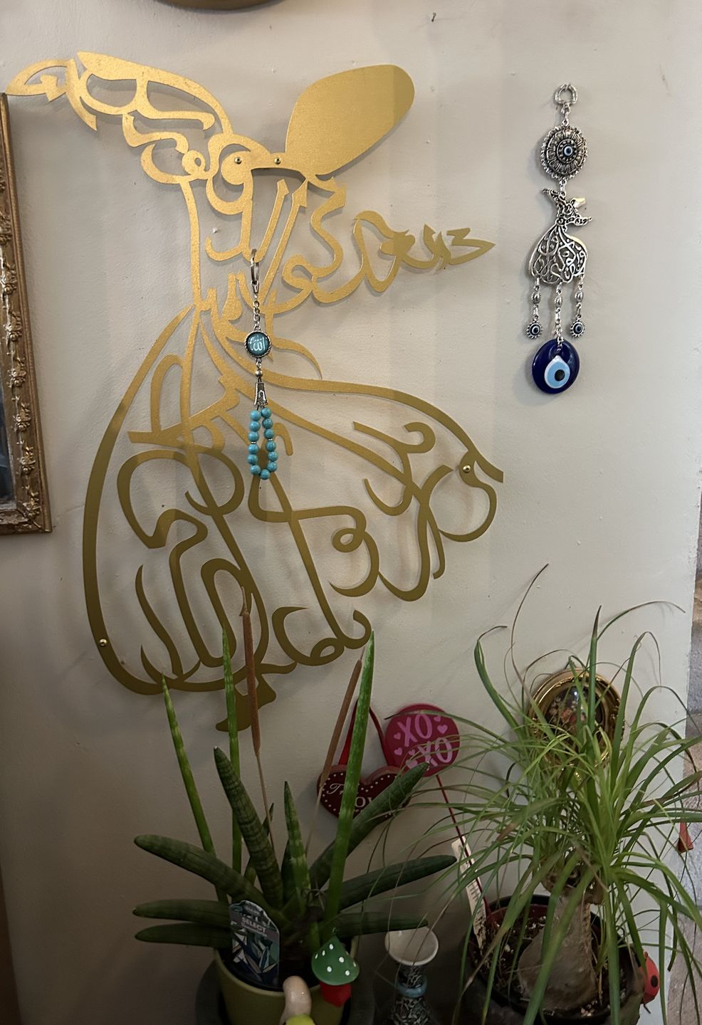 Customer photo review of Whirling Dervish Metal Islamic Wall Art