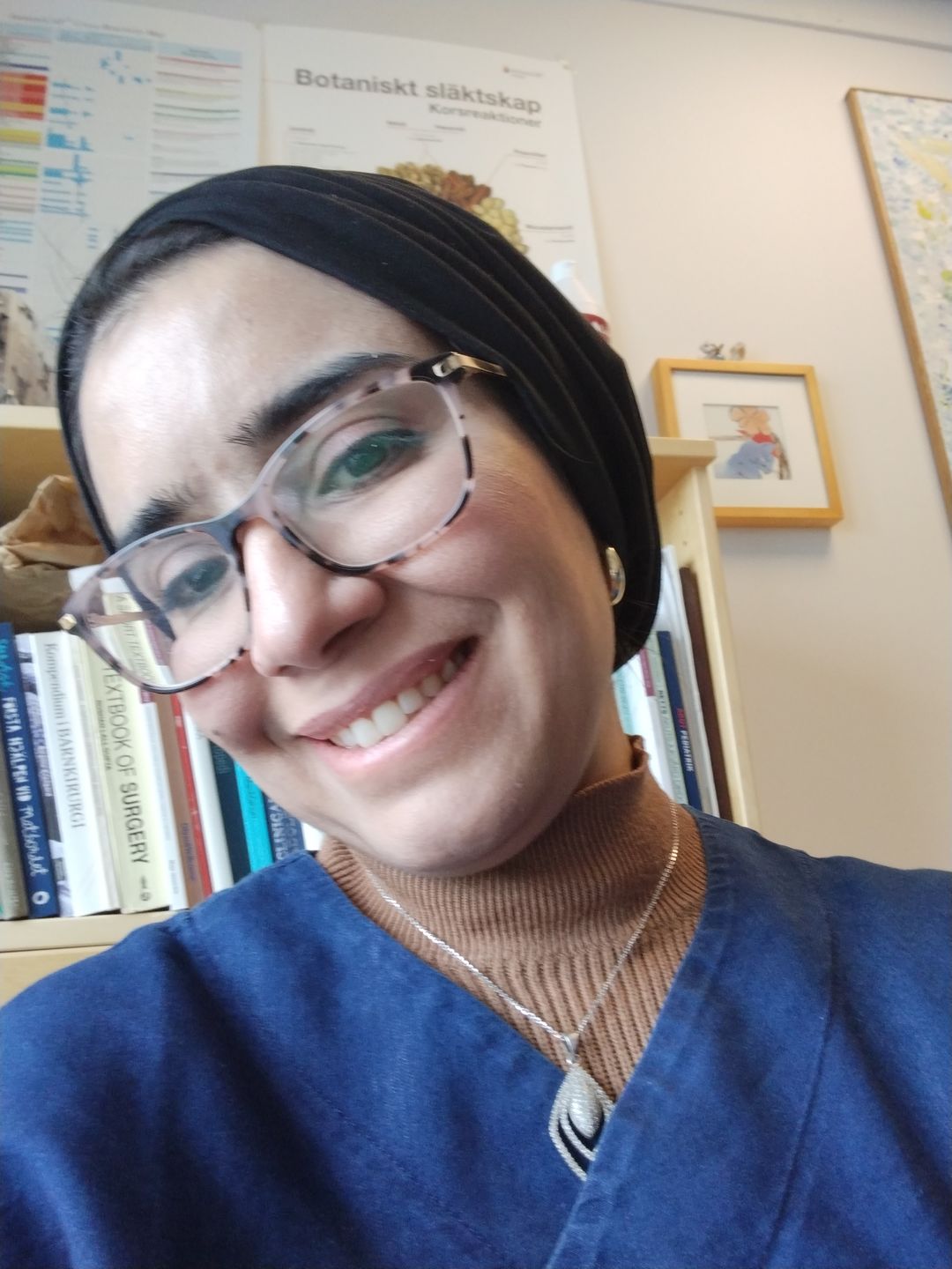 Customer photo review of Classic Drop Hoop Earrings