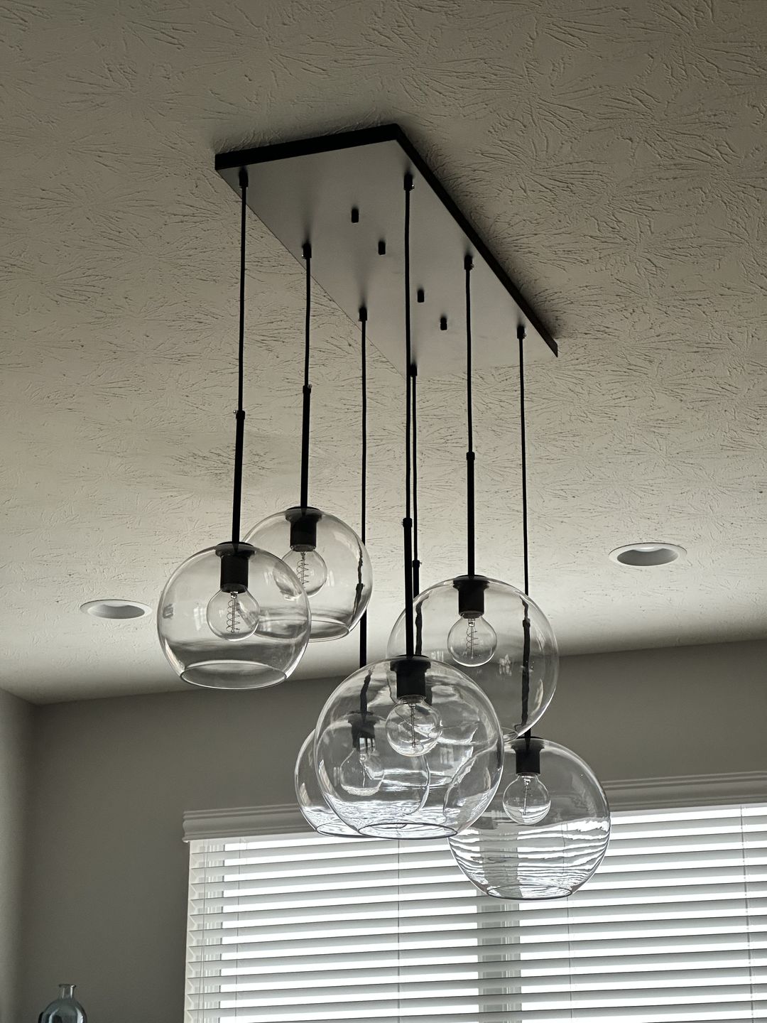 Customer photo review of Modern 7-Light Sculptural Glass Globe Pendant Chandelier