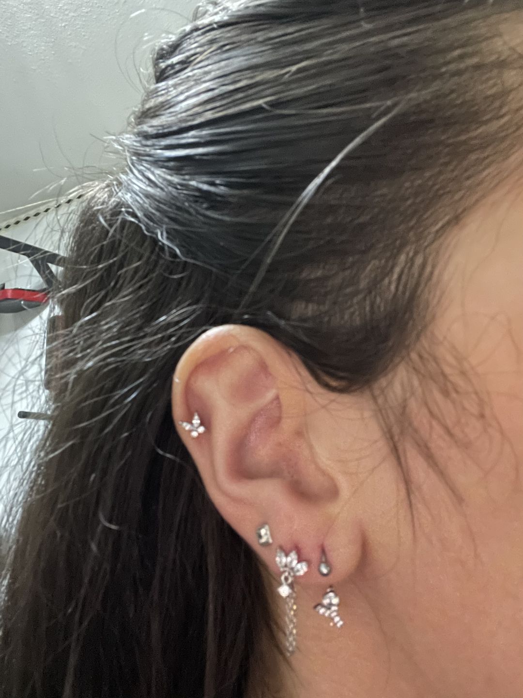 Customer photo review of Butterfly Piercing | Titan