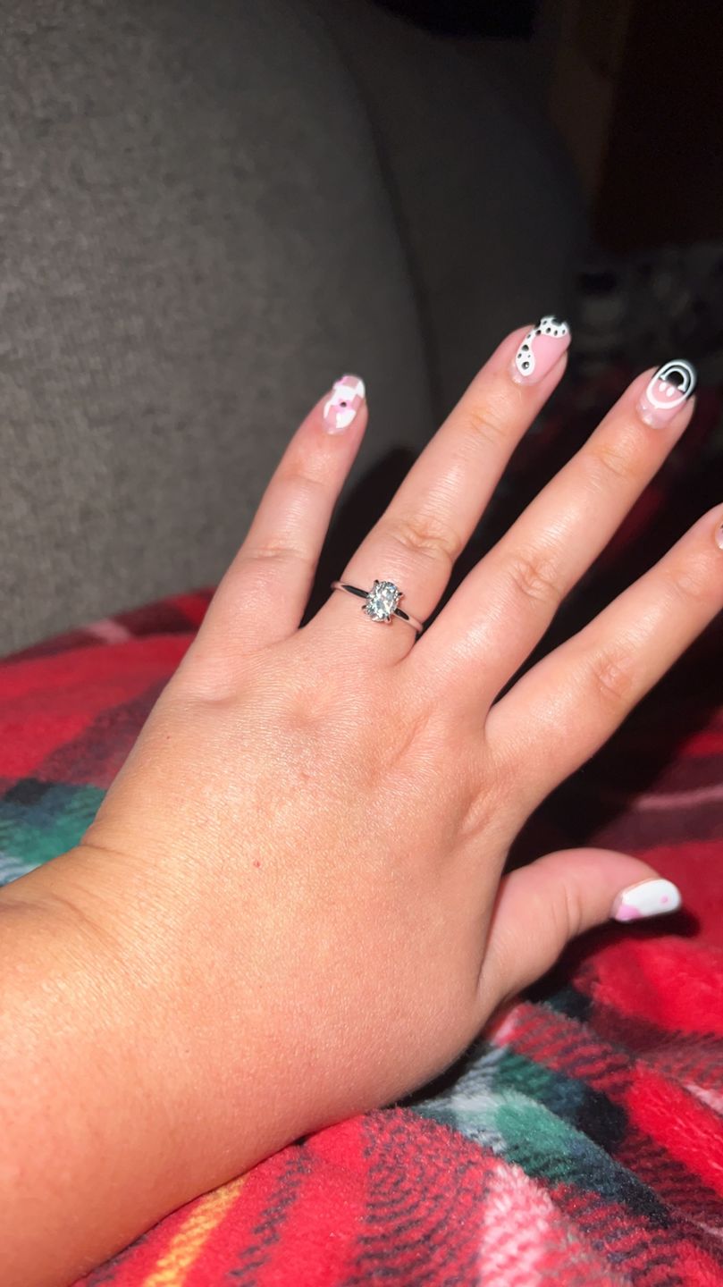 Customer photo review of Oval Moissanite Solitaire Engagement Ring