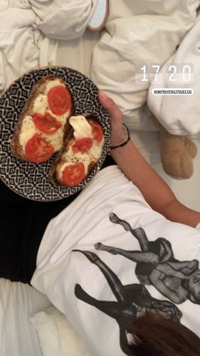 Customer photo review of 'After Party' baby tee