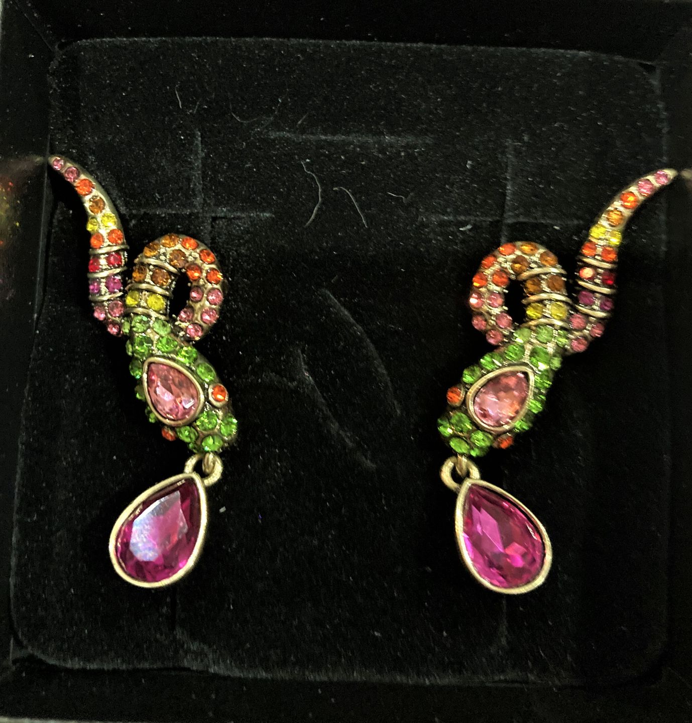 Customer photo review of HEIDI DAUS®"Gorgeous Glimmer Snake" Crystal Snake Dangle Earrings