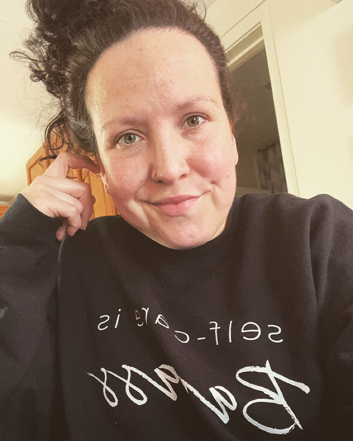 Customer photo review of Self-Care Is Badass Sweatshirt