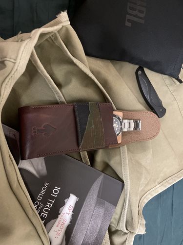 Customer photo review of W.O.E. Travel Pouch and Challenge Coin
