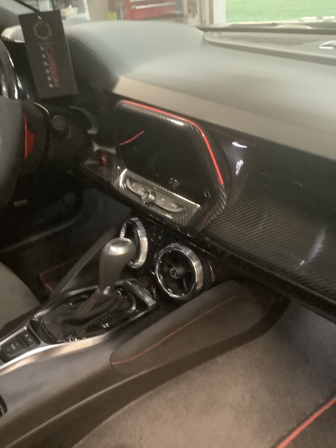 Customer photo review of CARBON FIBER PUSH START BUTTON COVER WITH LIGHT CUT OUT (BLACK/RED/BLUE) for 2016-2023- CAMARO/2014-2019 C7 CORVETTE