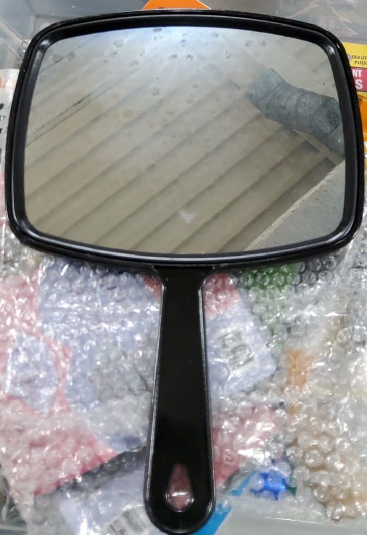Customer photo review of Hand Mirror, Black Handheld Mirror with Handle, 6.3" W x 9.6" L