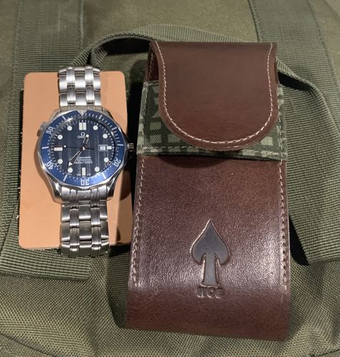 Customer photo review of W.O.E. Travel Pouch and Challenge Coin
