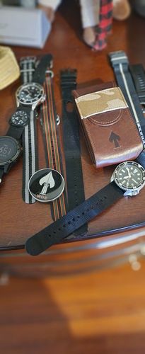 Customer photo review of W.O.E. Travel Pouch and Challenge Coin