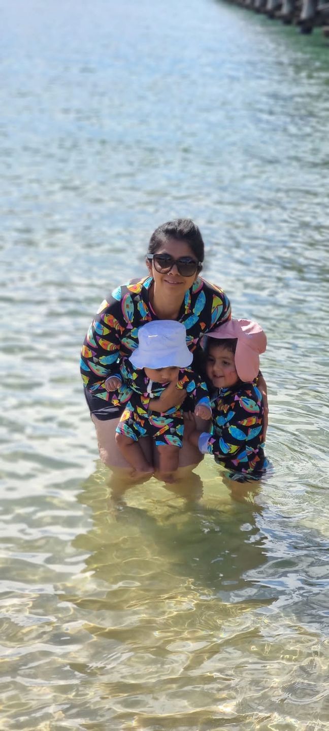 Customer photo review of Neon Fish Women's Long Sleeve Zip Swimsuit