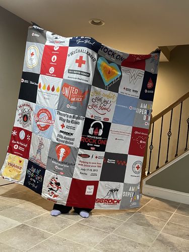 T-shirt quilt with community service, superheroes themes by Clay, from MD