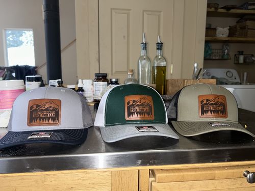 Customer photo review of Custom Leather Patch Trucker Hat - Richardson 112