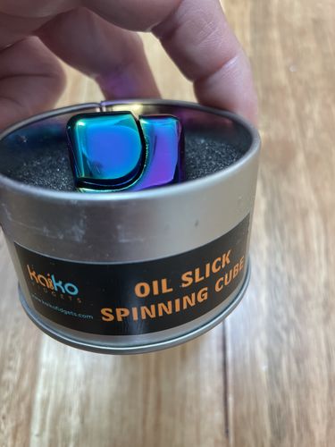 Customer photo review of Metal Spinning Cube Fidget - Oil Slick