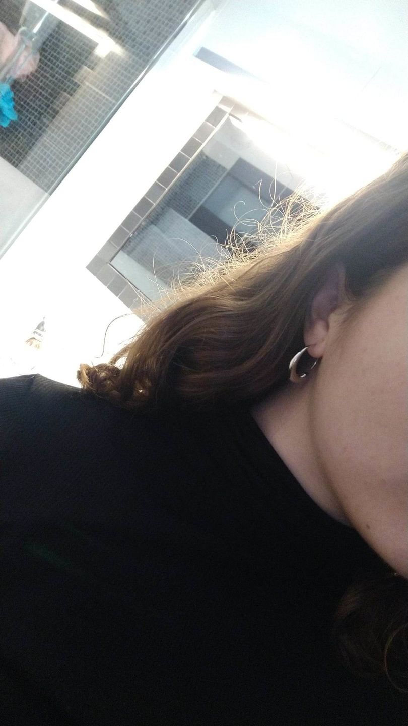 Customer photo review of Classic Drop Hoop Earrings