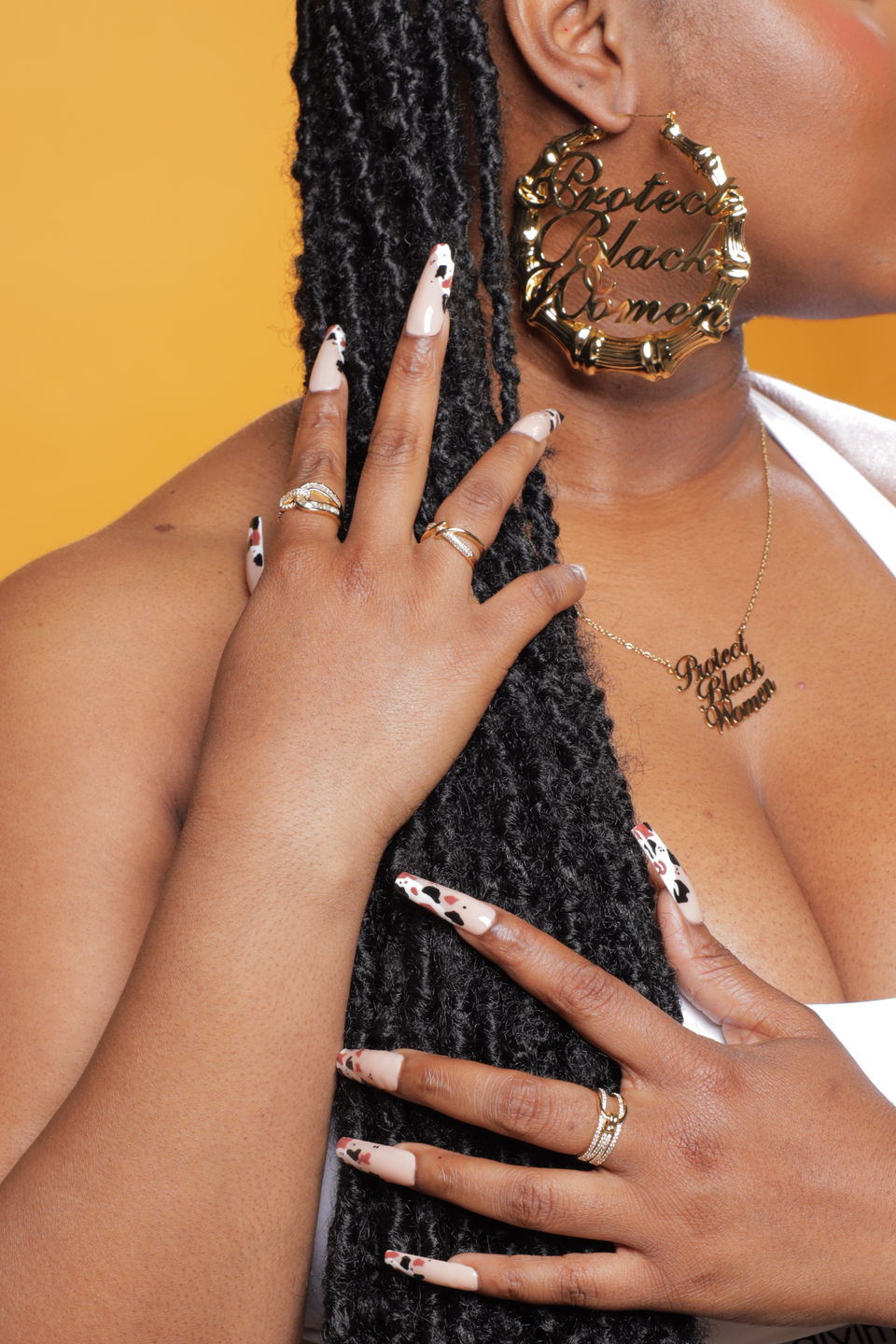 Customer photo review of 18k Gold Plated Protect Black Women Bamboo Hoop Earrings