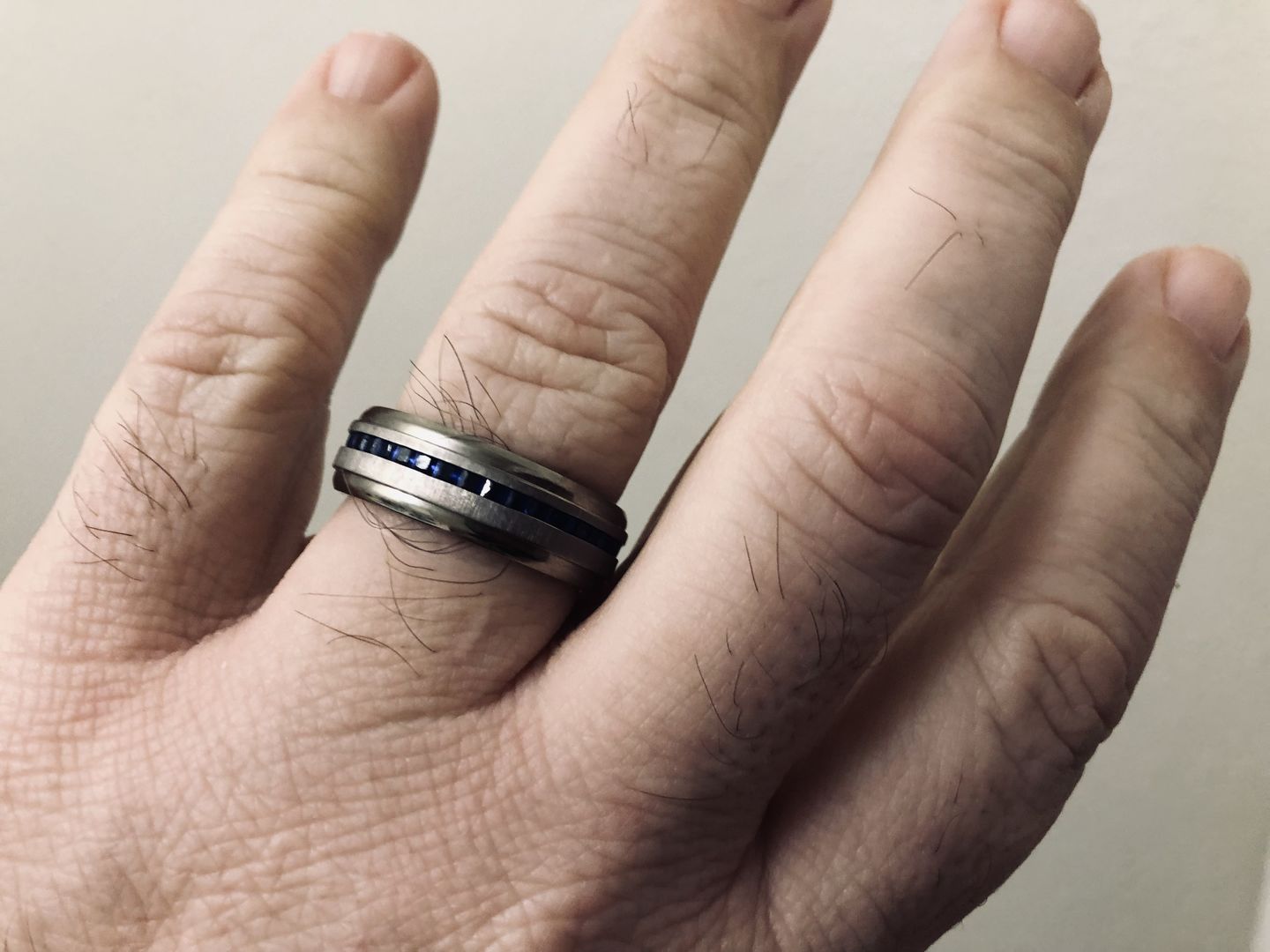 Customer photo review of 8mm - Mens Titanium Wedding Band With Blue Sapphire Titanium Ring