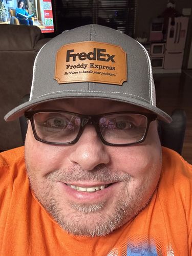 Customer photo review of Custom Leather Patch Trucker Hat - Richardson 112