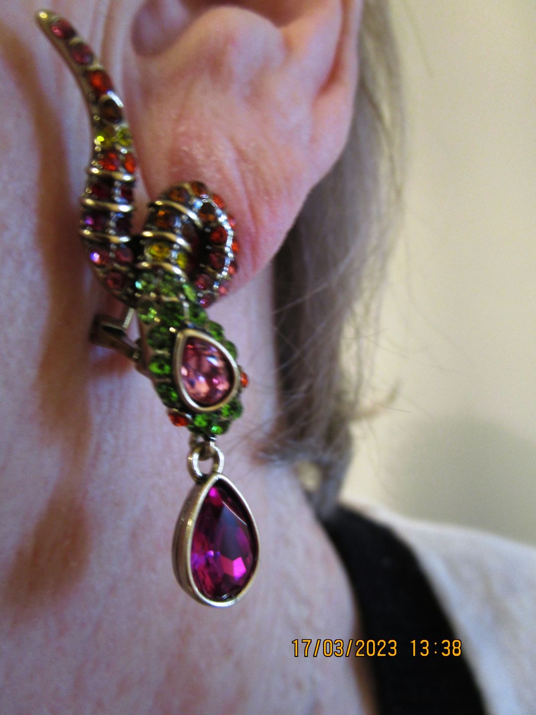 Customer photo review of HEIDI DAUS®"Gorgeous Glimmer Snake" Crystal Snake Dangle Earrings