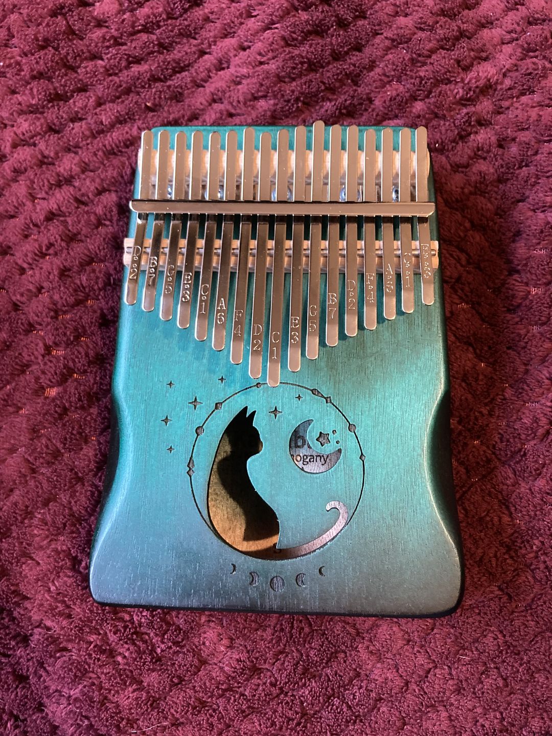 Customer photo review of Kalimba 17 Key Mahogany Moon Cat Brown / Blue