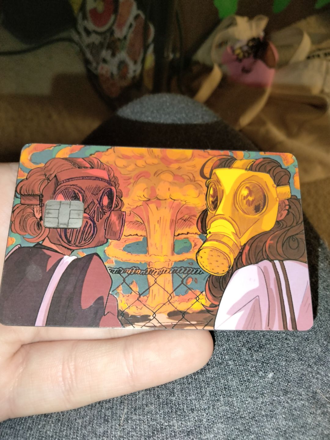 Customer photo review of Gas Mask Girls Credit Card Skins