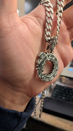 Customer photo review of Quetzalcoatl Pendant