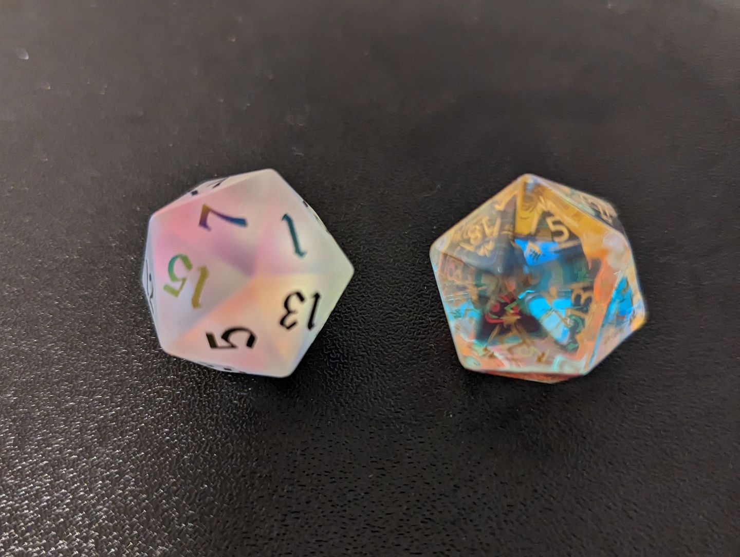 Customer photo review of Gemstone (Inked) Raised Dichroic Glass Polyhedral Dice (With Box) DND Set