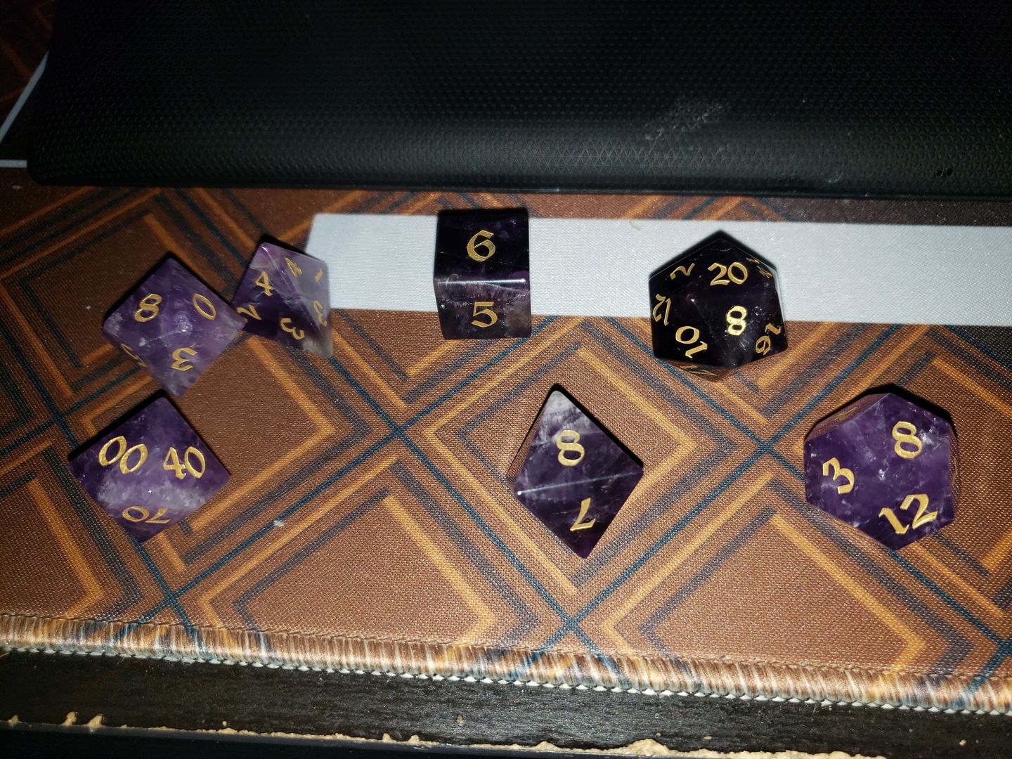 Customer photo review of Gemstone Amethyst Dice (With Box) Hand Carved Polyhedral Dice DND Set - Gift For Dnd, RPG Game