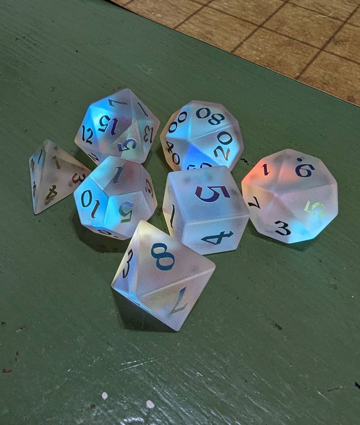 Customer photo review of Gemstone (Inked) Raised Dichroic Glass Polyhedral Dice (With Box) DND Set