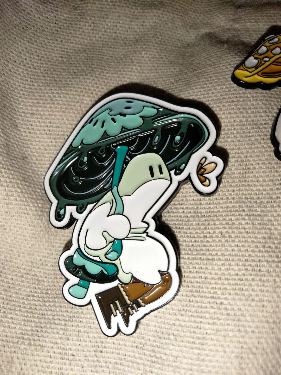 Customer photo review of Blue Mushroom Ghost Enamel Pin 2in