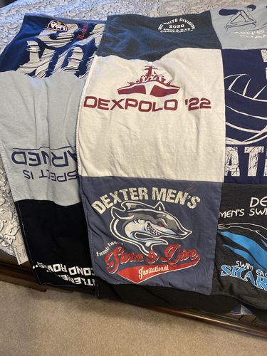 T-shirt quilt featuring dexter men's swim & dive by Margaret from MI