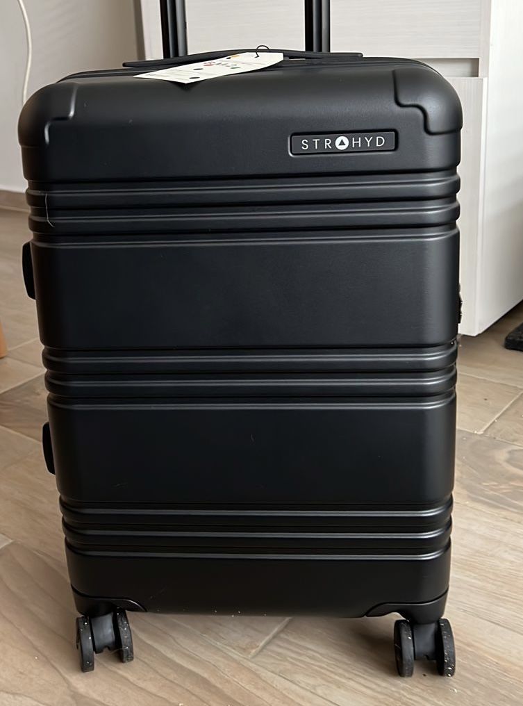 Customer photo review of Maleta Check—In .1