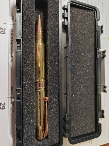 Customer photo review of .308 Real Bullet Authentic Brass Casing Refillable Twist Pen - Tactical Gift Box - Polished Brass
