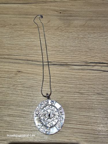 Customer photo review of Pendentif Amulette "Symboles Mystiques" en Argent