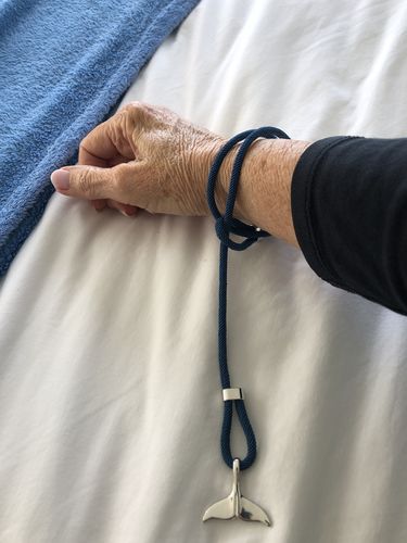 Customer photo review of "Whale" tracking bracelet