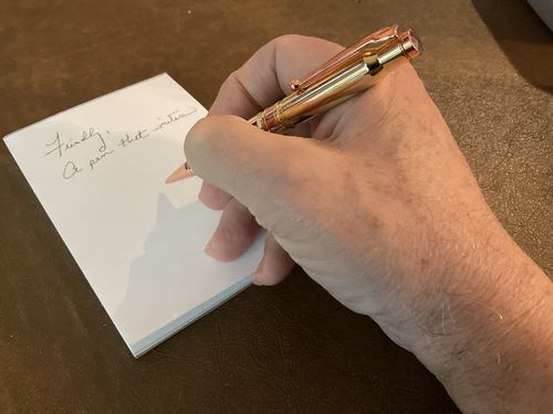 Customer photo review of .308 Real Bullet Authentic Brass Casing Refillable Twist Pen - Tactical Gift Box - Polished Brass