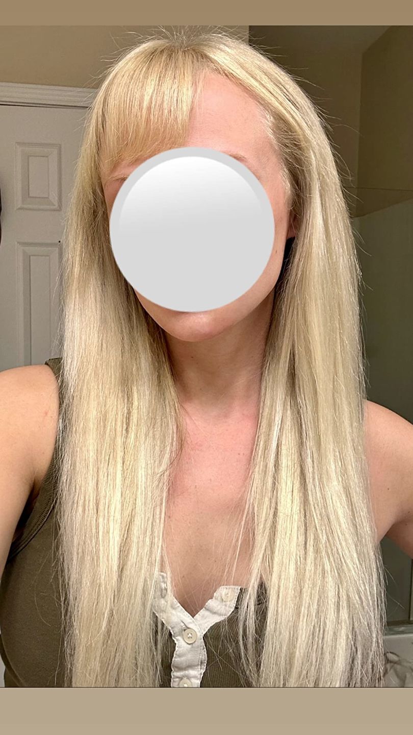 Customer photo review of Seamless Tape in Hair Extensions Best Virgin Hair Lightest Blonde #60