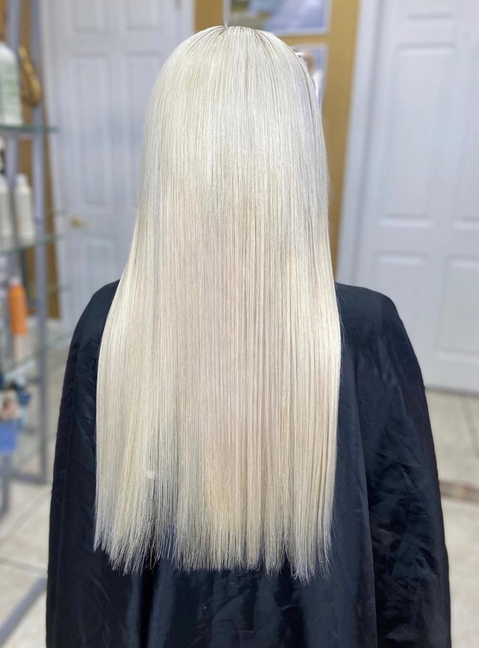 Customer photo review of Seamless Tape in Hair Extensions Best Virgin Hair Lightest Blonde #60