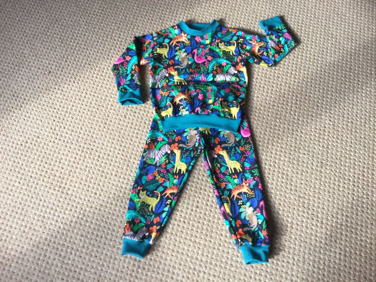 Customer photo review of Animal Jungle on Black French Terry Fabric