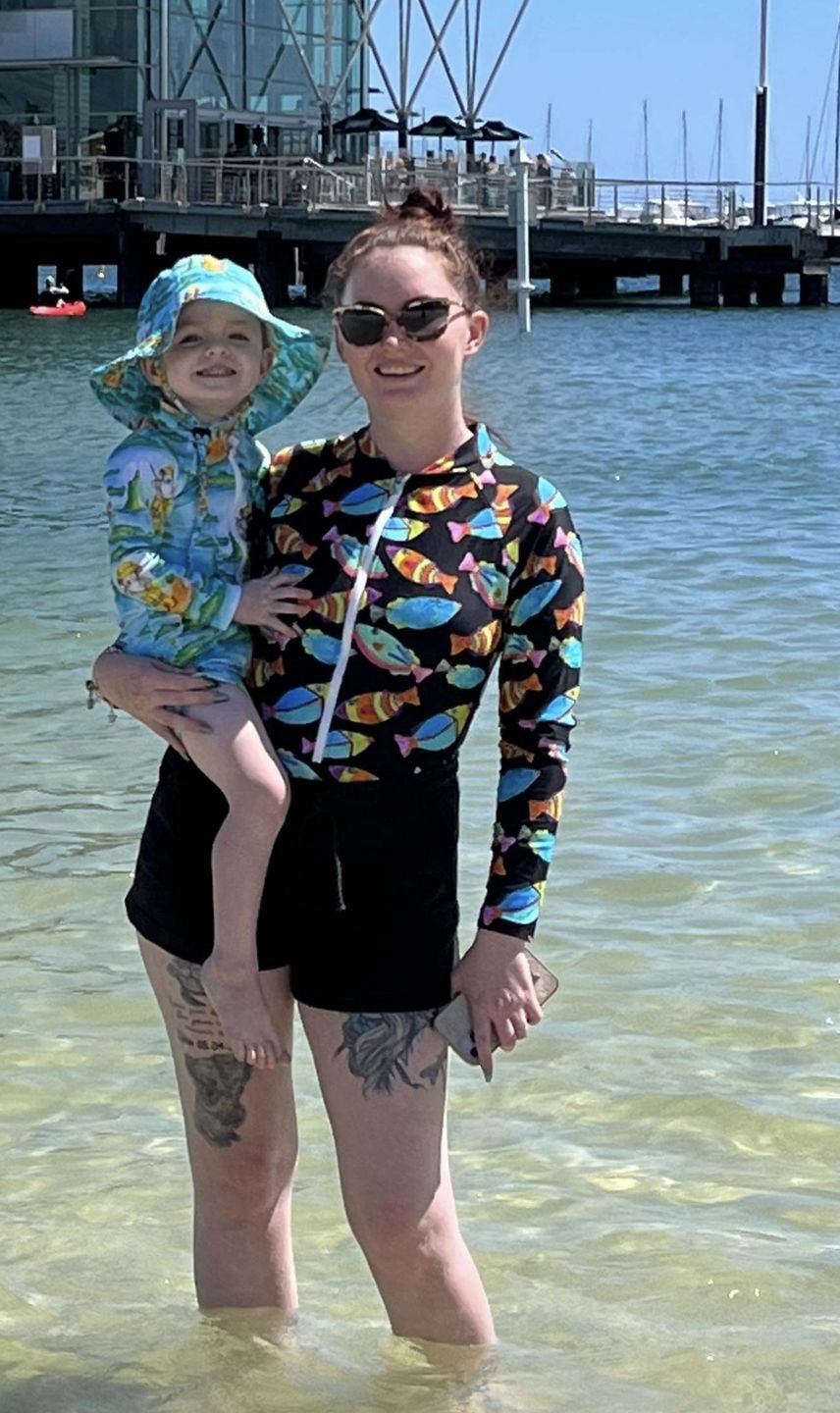 Customer photo review of Neon Fish Women's Long Sleeve Zip Swimsuit