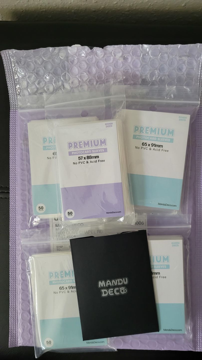 Customer photo review of PREMIUM PHOTOCARD SLEEVES - BLUE VERSION (65x91MM)