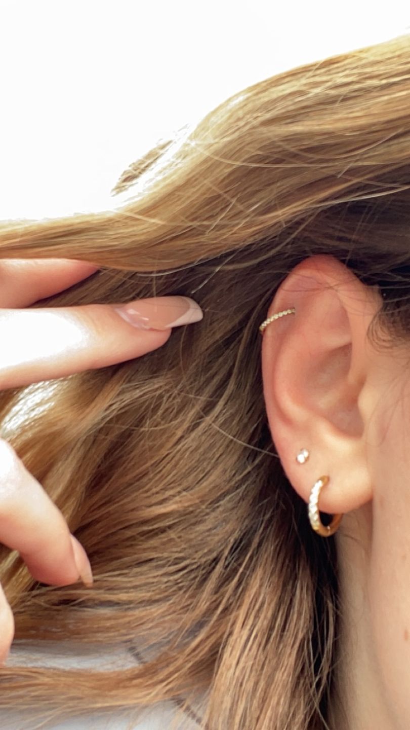 Customer photo review of Conch Clicker | Titan Piercing