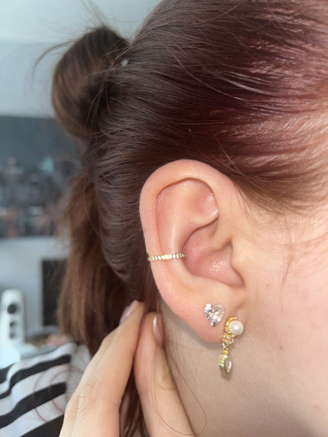Customer photo review of Conch Clicker | Titan Piercing