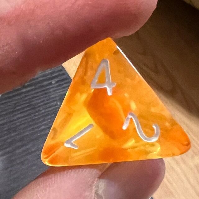 Customer photo review of Orange Tangerine Polyhedral Dice Set