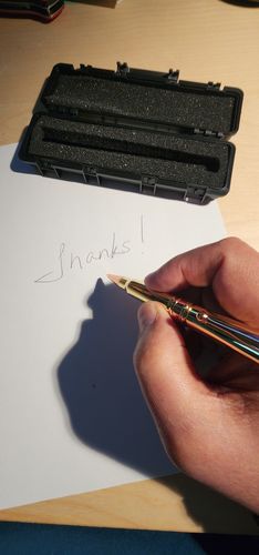 Customer photo review of .308 Real Bullet Authentic Brass Casing Refillable Twist Pen - Tactical Gift Box - Polished Brass