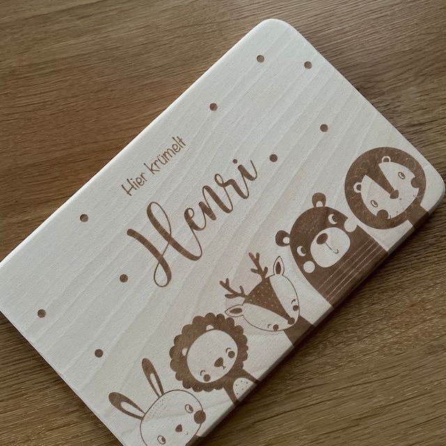 Customer photo review of Personalisiertes Frühstücksbrettchen Große Tierfamilie