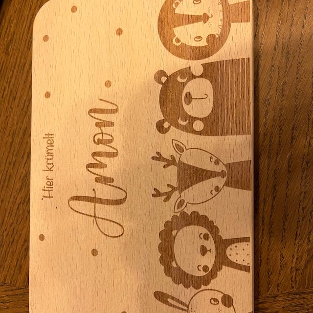 Customer photo review of Personalisiertes Frühstücksbrettchen Große Tierfamilie