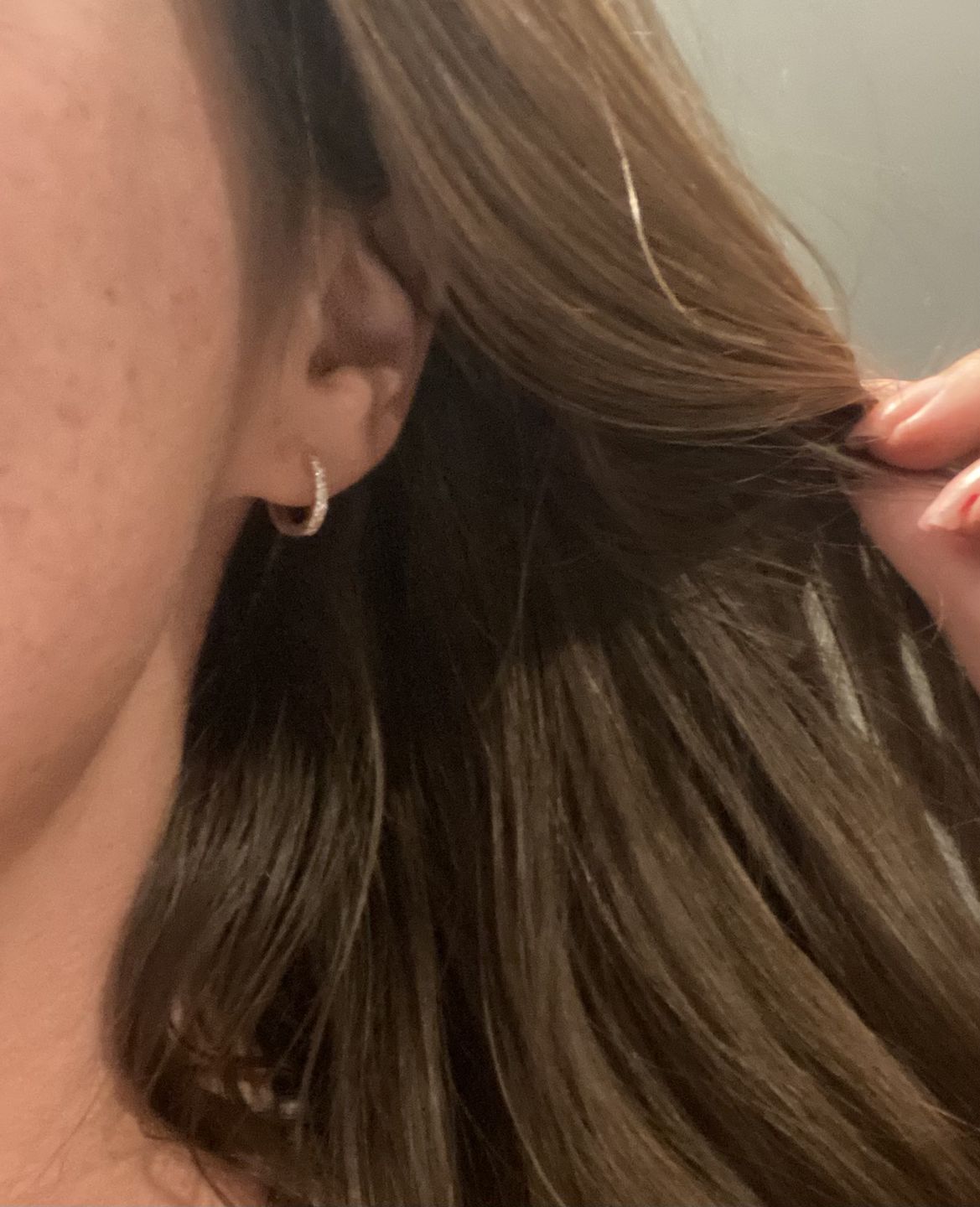 Customer photo review of Basic Sapphire Huggie Hoop Earrings
