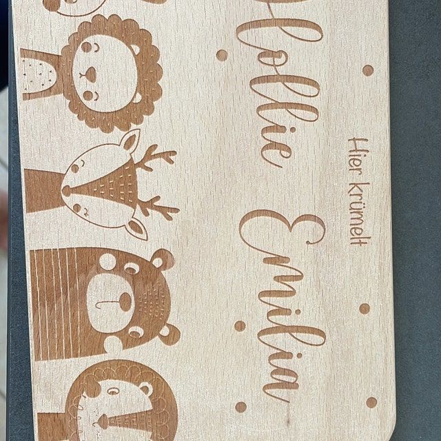 Customer photo review of Personalisiertes Frühstücksbrettchen Große Tierfamilie